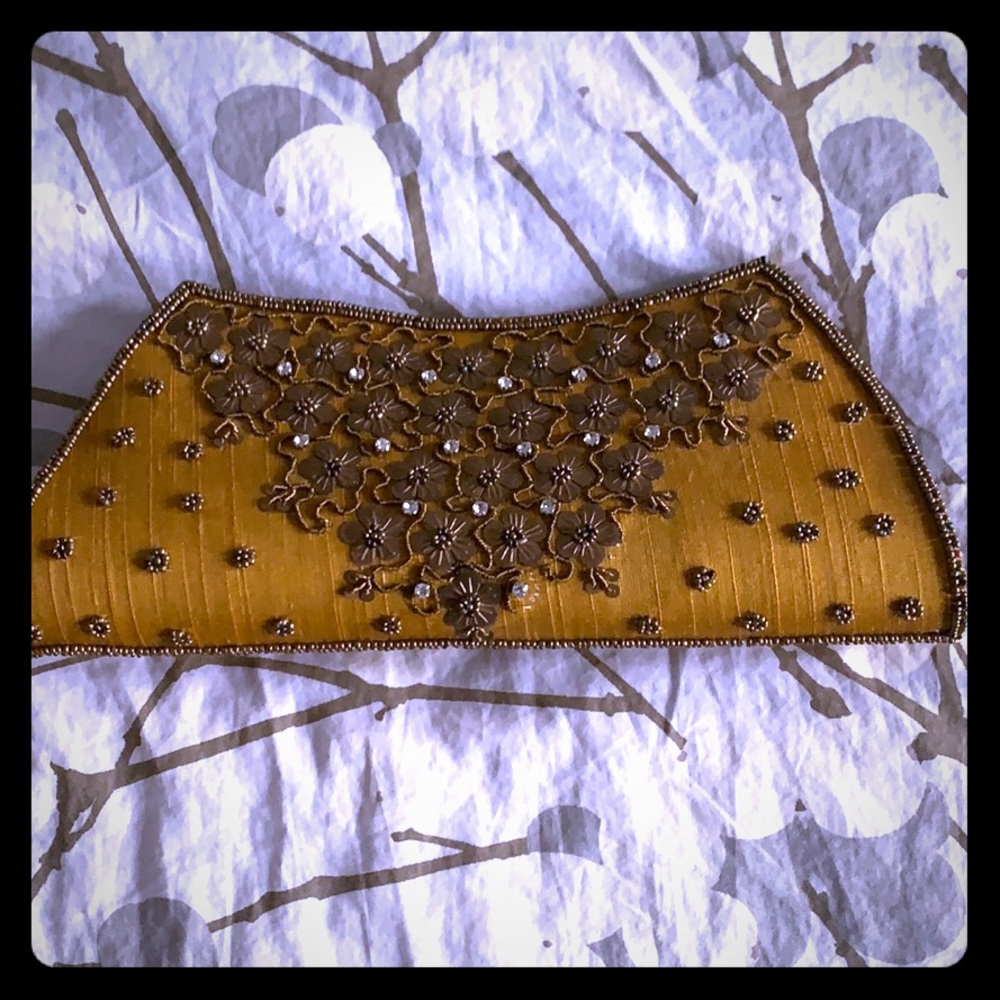 Hand clutch- beautiful gold and bronze piece